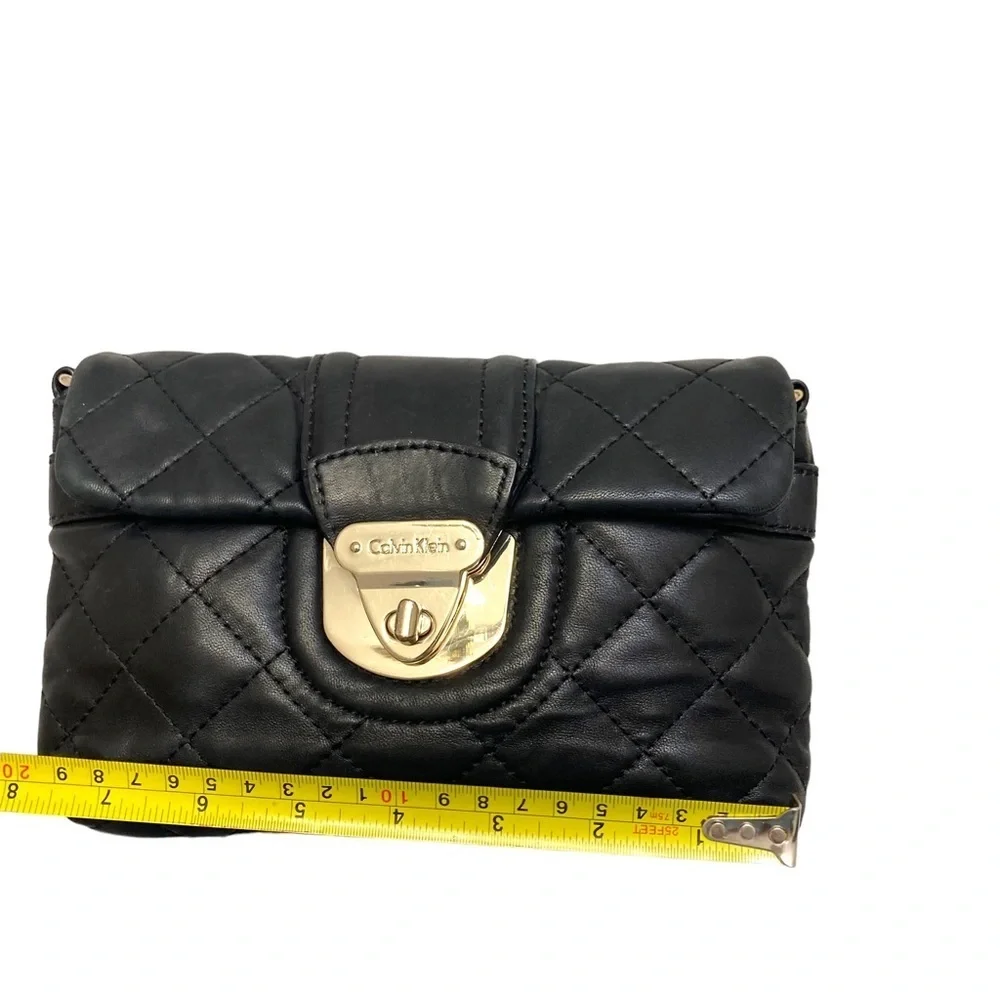 Calvin Klein quilted black leather clutch bag